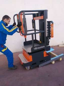 Unloading system of the machine from truck platform without forklift